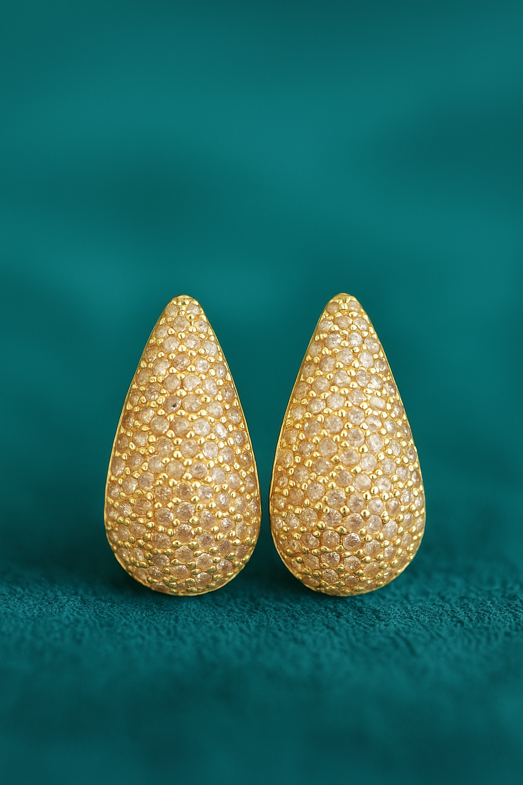 Beautiful pair of Tear Drop tone earrings.